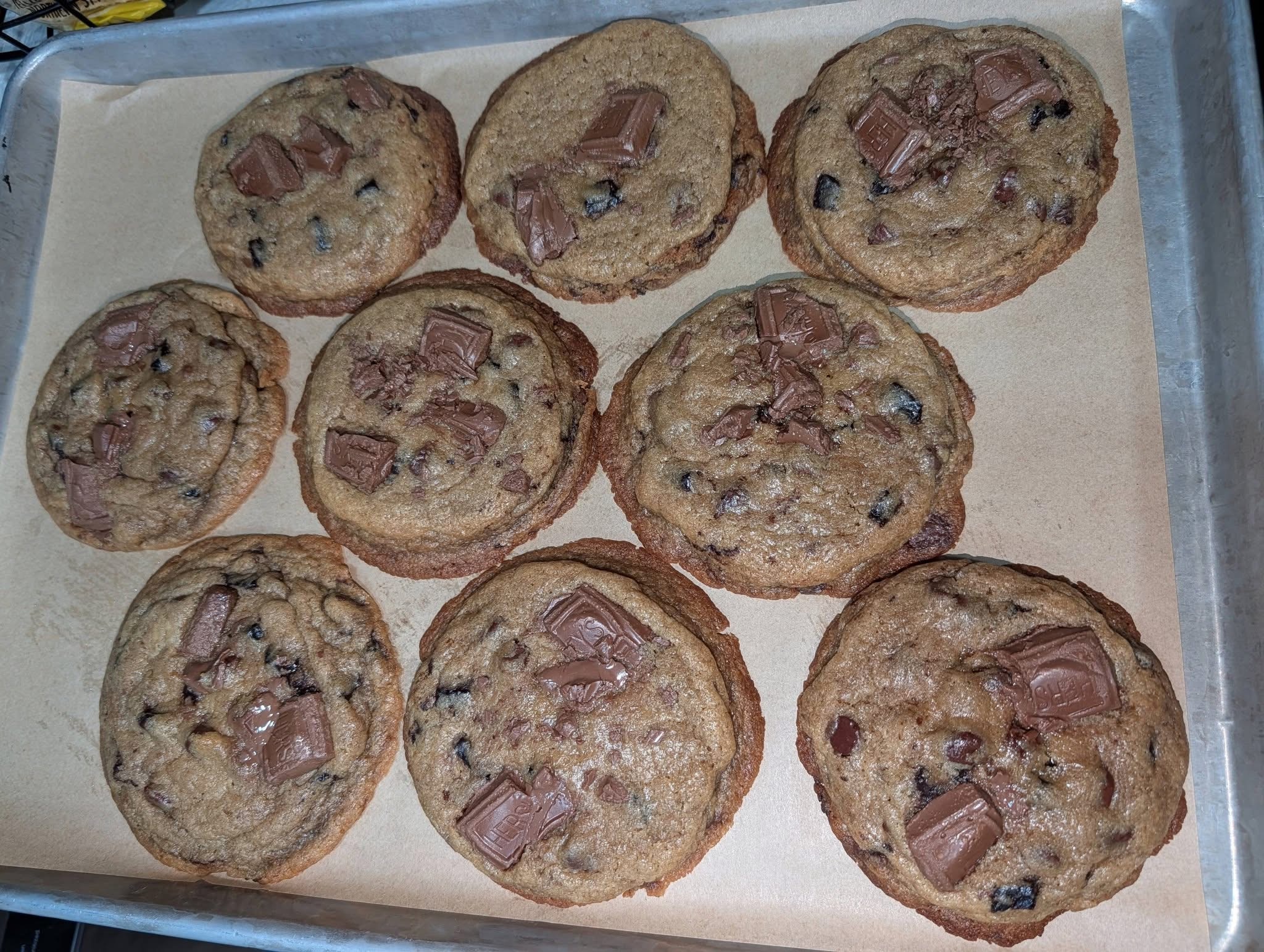 Chocolate chunk cookies on a baking tray